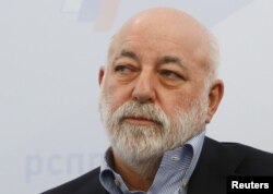 FILE - Chairman of the Board of Directors of Renova Group, Viktor Vekselberg attends a session during the Week of Russian Business, held by the Russian Union of Industrialists and Entrepreneurs (RSPP), in Moscow, Feb. 7, 2018.