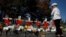 FILE - A woman looks at memorials along a bike path to remember the victims of the October 31 attack, in New York City, Nov. 3, 2017.
