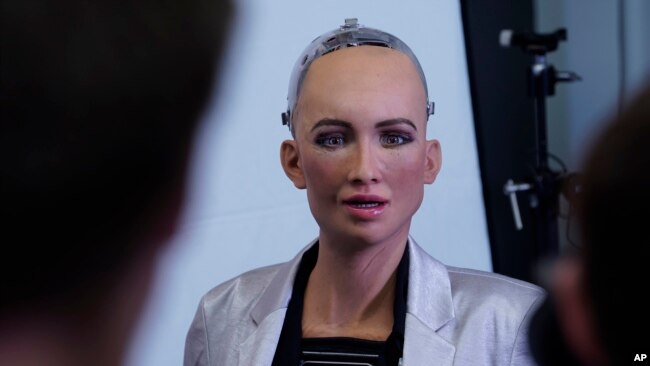 FILE - In this image released on Monday, Aug. 6, 2018, Sophia, a humanoid robot developed by Hanson Robotics, will welcome visitors to the new.New Festival in Stuttgart taking place on October 8-10 at the Hanns-Martin-Schleyer-Halle. (Hanson Robotics Limited/CODE_n via AP Images)