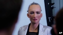 In this image released on Monday, Aug. 6, 2018, Sophia, a humanoid robot developed by Hanson Robotics, will welcome visitors to the new.New Festival in Stuttgart taking place on October 8-10 at the Hanns-Martin-Schleyer-Halle. (Hanson Robotics Limited/COD