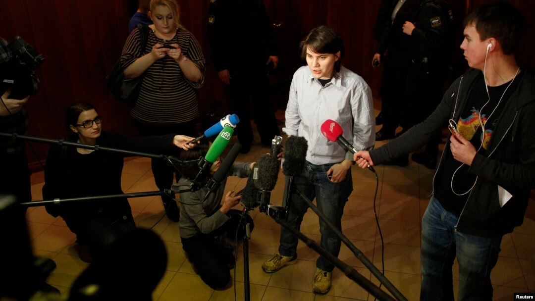 Yekaterina Samutsevich, a member of punk group Pussy Riot who was released from jail after her sentence was suspended on appeal, speaks to the media before a court hearing in Moscow, January 30, 2013.