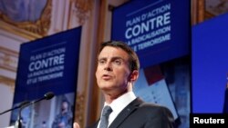 FILE - French Prime Minister Manuel Valls speaks at a news conference at the Hotel Matignon in Paris, May 9, 2016.