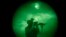 A U.S soldier patrols at night in Khost province, Afghanistan, seen through night vision equipment. About 400,000 veterans had a PTSD diagnosis in 2013, according to the Veterans Affairs health system.