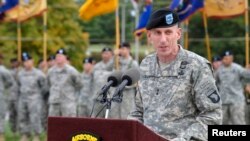 FILE - U.S. Army Major General Gary Volesky speaks during a ceremony at Fort Campbell, Kentucky, Oct. 14, 2014. Volesky says Iraqi forces are making "great progress" in reclaiming land lost to Islamic State militants.