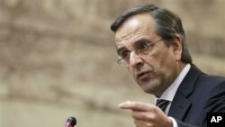 Conservative Greek opposition leader Antonis Samaras addresses conservative members of parliament in Athens, Wednesday, Nov. 2, 2011.