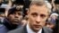 FILE - Oscar Pistorius leaves court after appearing for the 2013 killing of his girlfriend, Reeva Steenkamp, in the North Gauteng High Court in Pretoria, South Africa, on June 14, 2016. Pistorius was granted parole on Nov. 24, 2023.