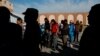 US Says Asylum-Seeking Migrants to Wait in Mexico 