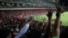 استادیوم محل برگزاری این بازی در هنگ کنگ تحت تاثیر اعتراضات اخیر در این دولت‌شهر علیه چین بود. 