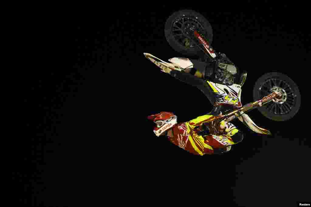 Spanish rider Maikel Melero performs a jump during the Malaga Freestyle motocross show at the Malagueta bullring in Malaga, southern Spain, Aug. 1, 2015. 