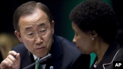 UN Secretary-General Ban Ki-moon (left) and Deputy Secretary-General Asha-Rose Migiro attend the opening of the Global Platform for Disaster Risk Reduction at the UN Office at Geneva, Switzerland, May 10, 2011