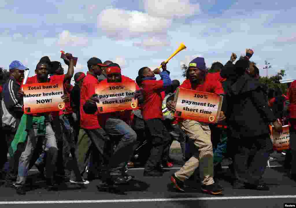 Members of the National Union of Metalworkers of South Africa (NUMSA) march during a strike in Cape Town, Sept. 9, 2013.&nbsp;
