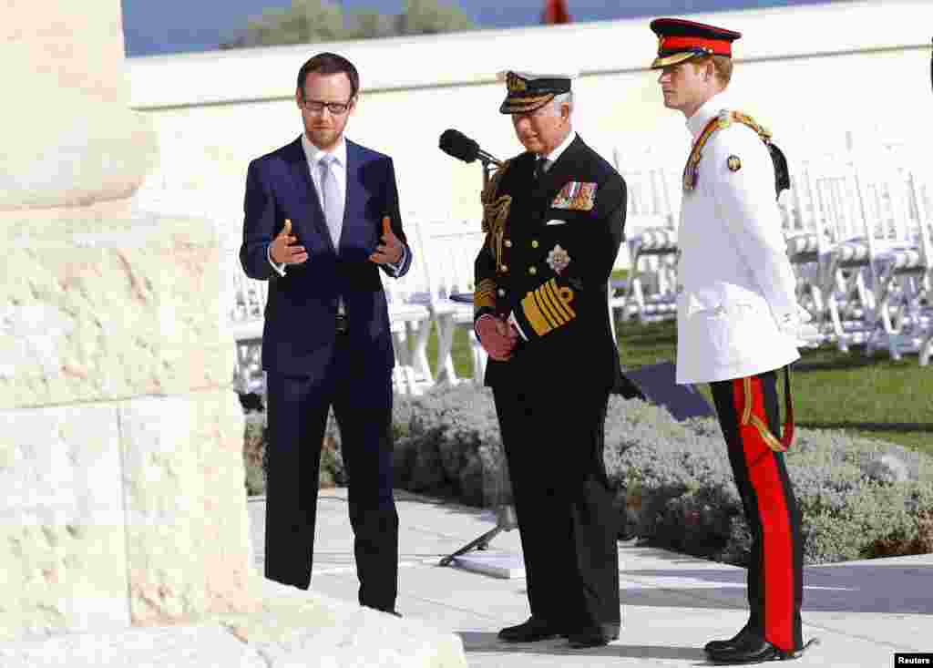 Britain's Prince Charles, center, and Prince Harry, right, visit Turkey's Cape Helles British Memorial before a ceremony marking the Battle of Gallipoli's 100th anniversary, April 24, 2015.