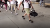 A undated video screenshot shows migrants passing through Paso Canoas, Panama, on their way back to their home countries from the U.S., Feb. 11-13, 2025.