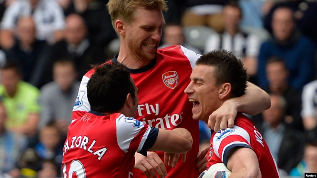 Para pemain tim Arsenal Lourent Koscielny (kanan), Santi Cazorla (kiri) dan Per Mertesacker. (Foto: Dok)