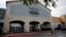 A shopper leaves a Whole Foods Market, June 16, 2017, in San Antonio, Texas.