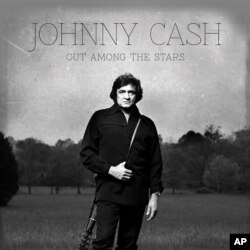 This photo provided by Columbia/Legacy shows the Johnny Cash album cover for "Out Among the Stars," to be released March 25, 2014.