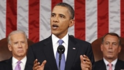 President Obama addressing both houses of Congress. Vice President Joe Biden, left, and House Speaker John Boehner are behind him.