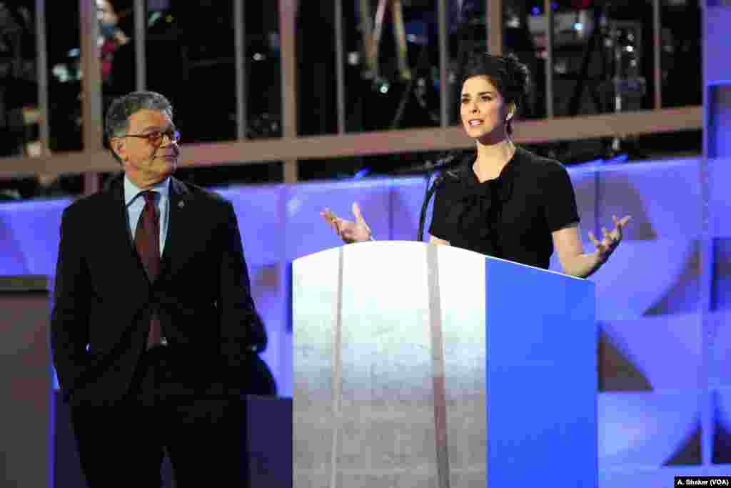 Senator Al Franken of Minnesota, left, and comedian Sarah Silverman introduce singer Paul Simon during the Democratic National Convention in Philadelphia, July 25, 2016. (A. Shaker/VOA)