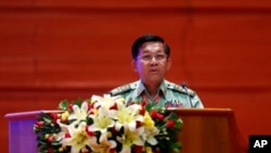 FILE - Myanmar's Army Commander Senior Gen. Min Aung Hlaing speaks during a ceremony at the Myanmar International Convention Center in Naypyitaw, Myanmar, Oct. 28, 2019.