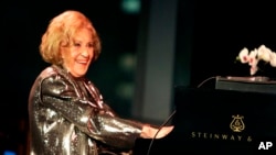 FILE - Marian McPartland playing the piano during a celebration of her 90th birthday at Jazz at Lincoln Center in New York, March 19, 2008.