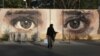 Afghan Artist Paints Kabul's Walls of War to Help Heal City