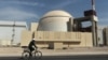 Iran Sanctions Eased as Tehran Curbs Nuclear Enrichment 