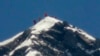 A team of climbers, including 80-year-old Japanese mountaineer Yuichiro Miura, stand on the summit of Mount Everest, in this photo taken by Kyodo, May 23, 2013.