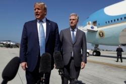 President Donald Trump and Robert O'Brien, just named the new national security adviser, speak to the media at Los Angeles International Airport, Sept. 18, 2019.