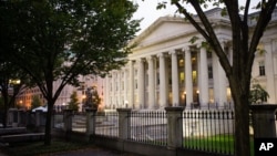 FILE - The U.S. Treasury Building in Washington.