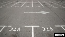 Empty parking spots for ride-hailing services, know in Spain as VTC (transport vehicles with driver) are seen at Barcelona's airport, Spain, Jan. 31, 2019. 