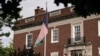 FILE - An Afghan flag flutters outside the Afghan embassy in Washington, Aug. 15, 2021, on the day Taliban insurgents entered Afghanistan's capital, Kabul. 