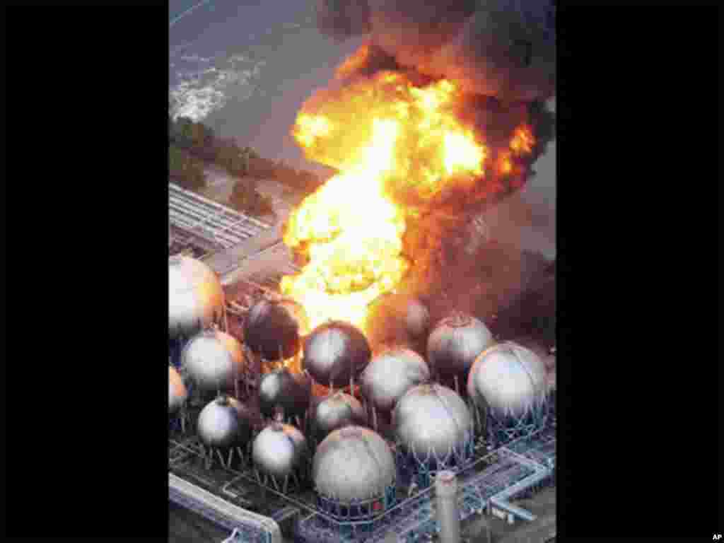 Oil refinery facility is on fire in Ichihara, Chiba Prefecture, near Tokyo, Friday, March 11, 2011, after strong earthquakes hit Japan