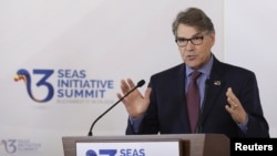 FILE - U.S. Energy Secretary Rick Perry speaks during the Three Seas Initiative Summit in Bucharest, Romania, Sept. 18, 2018.