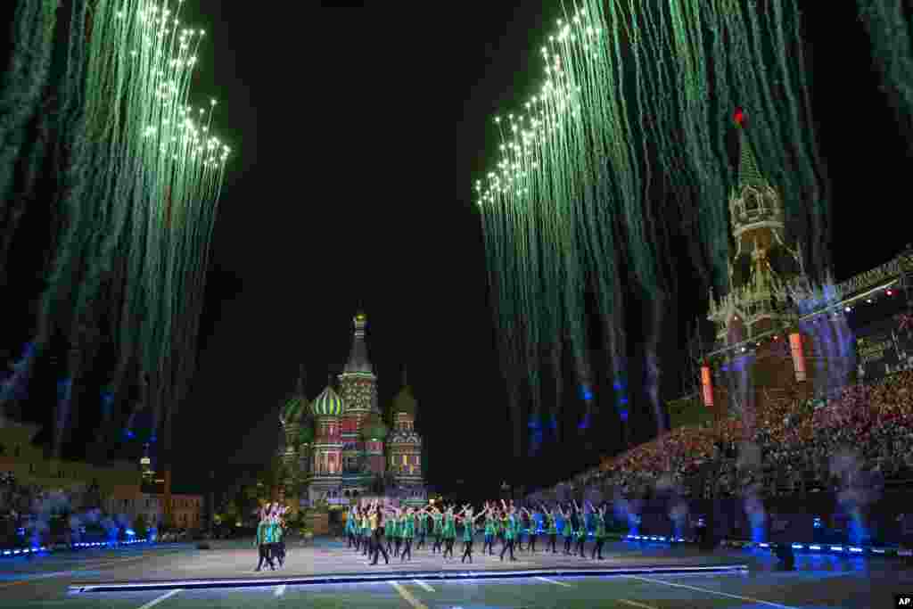 Participants perform during the closing of the Spasskaya Tower international military music festival in Red Square in Moscow, Russia, Sept. 2, 2018.