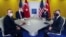 Turkey's President Recep Tayyip Erdogan (L back), Turkish Foreign Minister, Mevlut Cavusoglu (L), U.S. President Joe Biden (R back) and U.S. Secretary of State Antony Blinken (R) attend a meeting during the G20 Summit at the Roma Convention Center La Nuvola in Rome, Italy.
