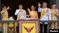 Thailand's King Maha Vajiralongkorn, Queen Suthida, Princess Bajrakitiyabha, Prince Dipangkorn and Princess Sirivannavari Nariratana are seen at the balcony of Suddhaisavarya Prasad Hall at the Grand Palace in Bangkok, May 6, 2019.