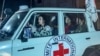 This image taken from video shows an International Red Cross vehicle reportedly carrying hostages released by Hamas as it crosses the Rafah border point in the Gaza Strip towards Egypt, from where they would be flown to Israel, on Nov. 24, 2023.