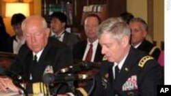 U.S. President Barack Obama demonstrates "the Soccket Ball," which uses kinetic energy to provide power to charge a cell phone or power a light, during an event at the Ubungo power plant to promote energy innovation in Dar Es Salaam, Tanzania.