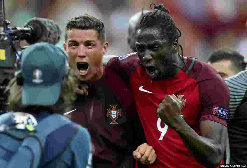 Cristiano Ronaldo e Éder (marcador do único golo do jogo) celebram a vitória de Portugal frente à França. UEFA EURO 2016