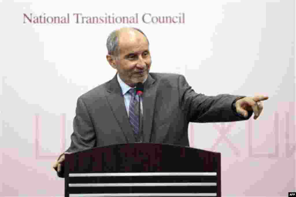 National Transitional Council chairman Mustafa Abdul-Jalil, gestures during a press conference in the rebel-held town of Benghazi, Libya, Tuesday, Aug. 16, 2011. Libya's rebels threatened to isolate Tripoli by blocking key supply routes and cutting oil p