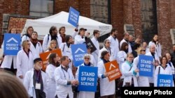 FILE - Scientists demonstrate outside the American Geophysical Union meeting in San Francisco in December, 2016. (The Natural History Museum.)