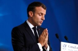 French President Emmanuel Macron speaks during a media conference at an EU summit in Brussels, Oct. 18, 2019.