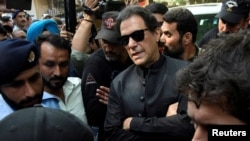 FILE PHOTO: Pakistan's former Prime Minister Imran Khan appears at a court, in Islamabad