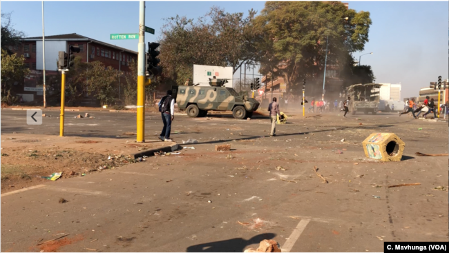FILE - The international community and human rights groups have condemned the way President Emmerson Mnangagwa's government used the army to disperse opposition protesters demanding the release of credible election results. At least six people were killed in the protests in Harare, Aug. 1, 2018.