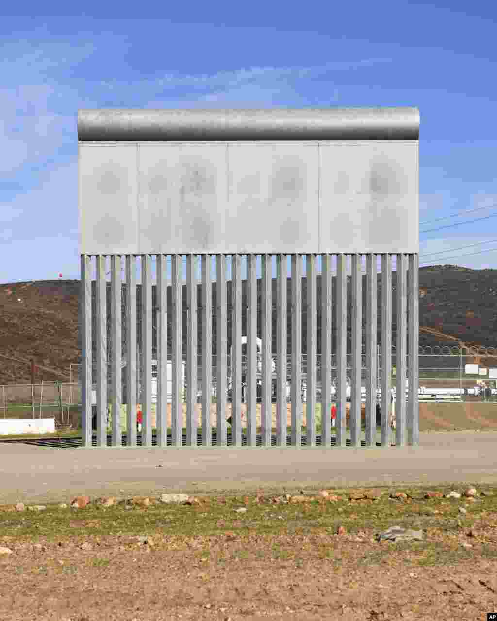 A border wall prototype stands in San Diego near the Mexico-U.S. border, seen from Tijuana, Mexico, Dec. 22, 2018. 