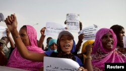 FILE - Mauritanian anti-slavery protesters march to demand the liberation of imprisoned abolitionist leader Biram Dah Abeid in Nouakchott, May 26, 2012. 