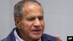 Sirhan Sirhan gestures during a Board of Parole Suitability Hearing at the Pleasant Valley State Prison in Coalinga, California, March 2, 2011, . 