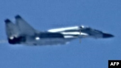 A picture released by AFRICOM on May 26, 2020, reportedly shows a Russian MiG-29 Fulcrum jet flying over Libya.