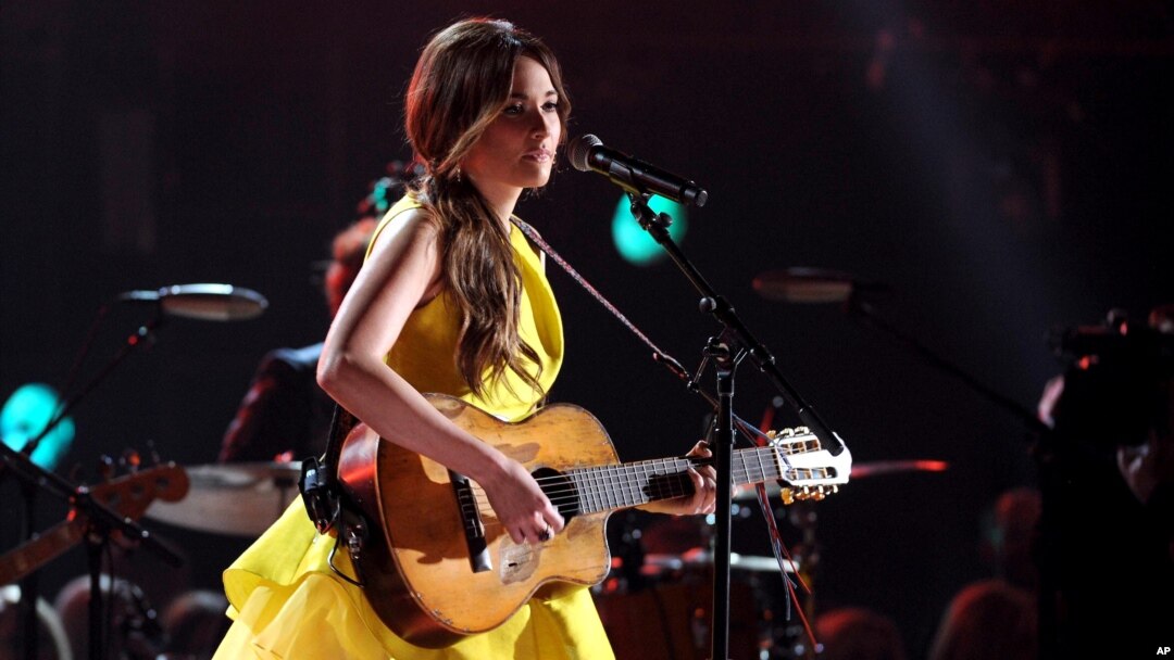FILE - Kacey Musgraves performs onstage at The 47th Annual CMA Awards at Bridgestone Arena in Nashville, Tennessee, Nov. 6, 2013.