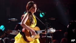 FILE - Kacey Musgraves performs onstage at The 47th Annual CMA Awards at Bridgestone Arena in Nashville, Tennessee, Nov. 6, 2013.